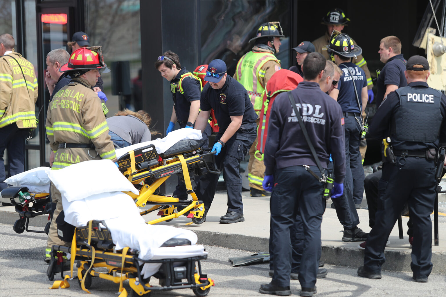 PHOTOS: 8 injured, 1 Critical At Car Vs Building Crash At Verizon Store
