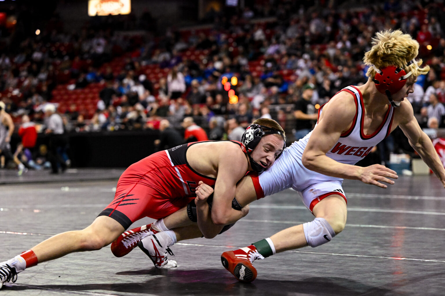 PHOTOS: Day 1 of WIAA state individual wrestling tournament - KFIZ News ...